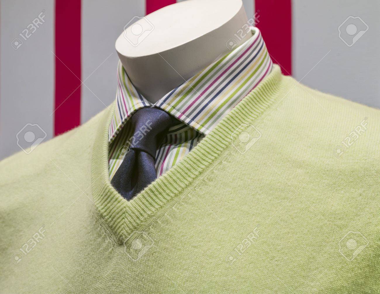 blue shirt green sweater