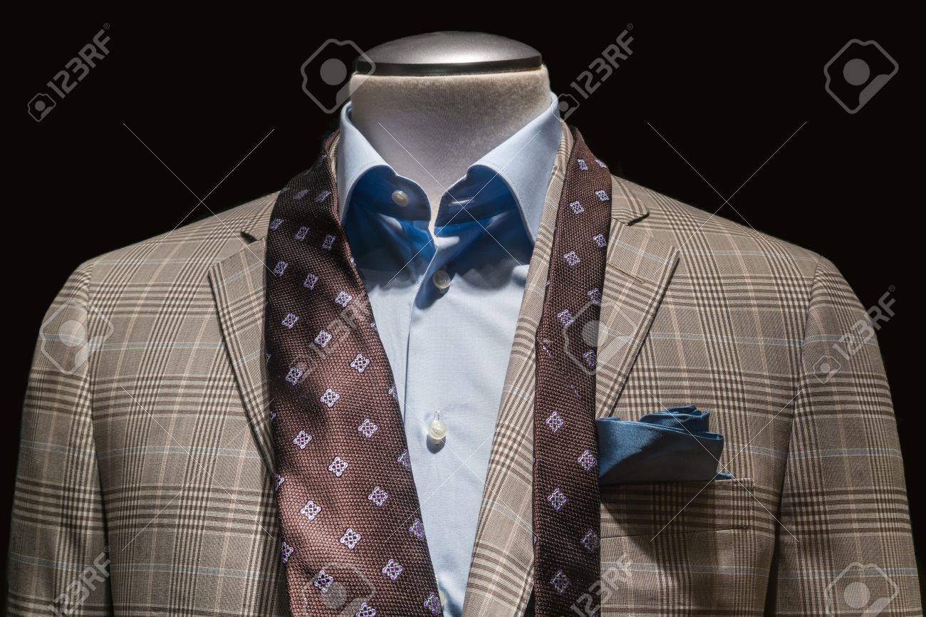 青いシャツ アンタイド茶色のネクタイと黒の背景に青緑のハンカチと日焼け格子縞ジャケットのクローズ アップ の写真素材 画像素材 Image