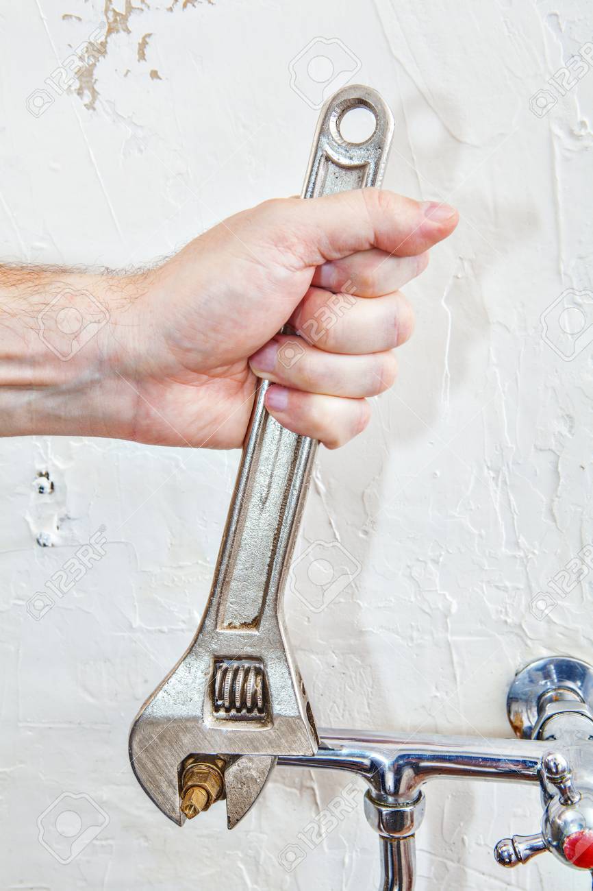 Two Handle Kitchen Faucet Repair Closeup Plumbers Hands