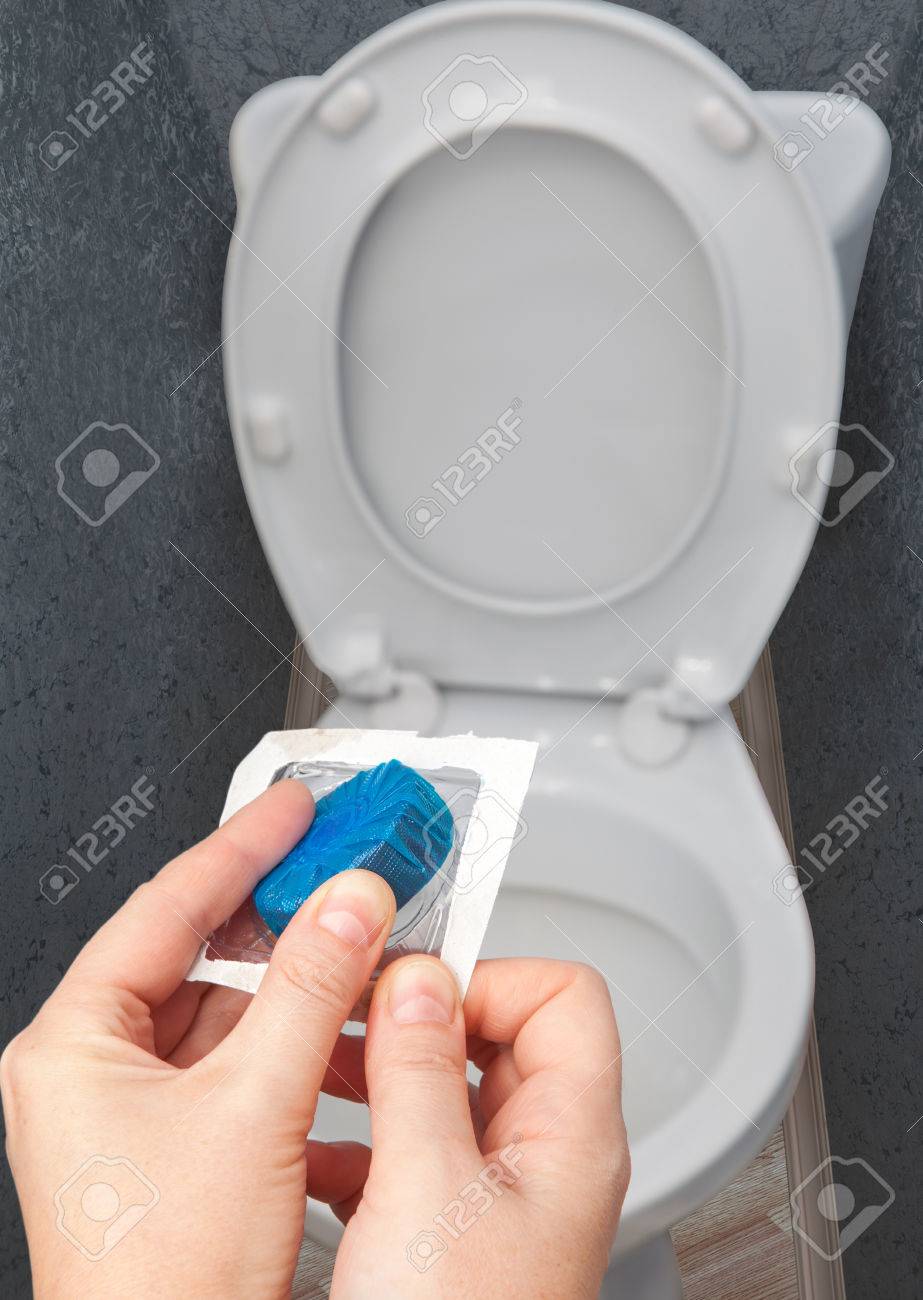 Hands Holding Chemical Blue Toilet Bowl Solid Cleaner Tablets Stock Photo Picture And Royalty Free Image Image 63036747
