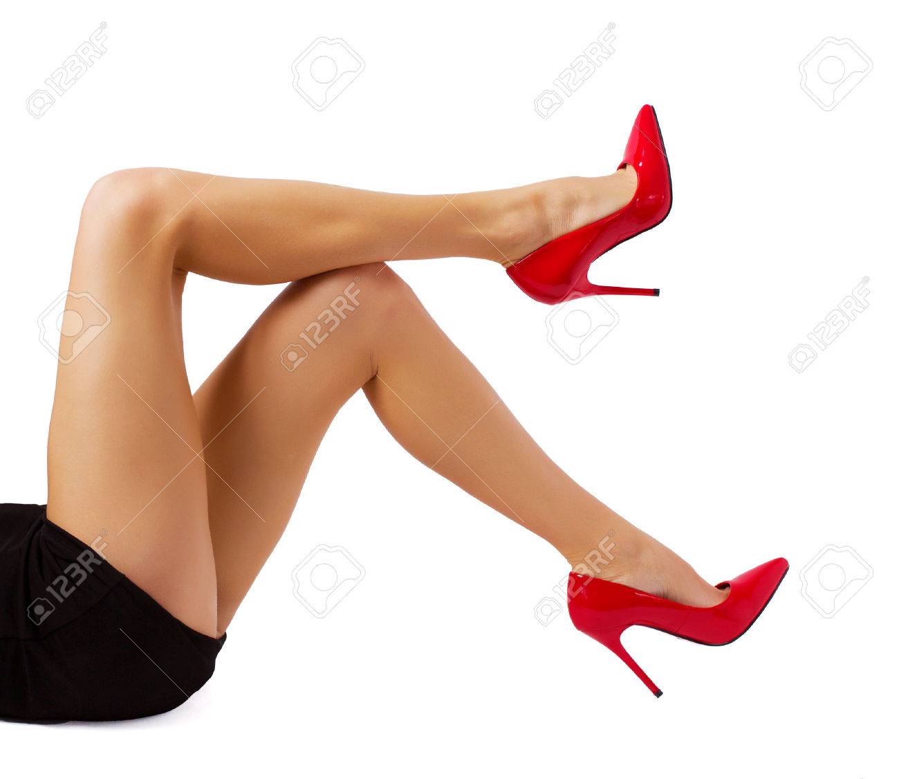 Photo of Black woman leg in sexy red high heel shoe