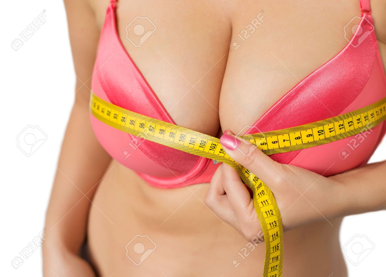 Woman With Big Breasts Measuring Her Bust Stock Photo, Picture And Royalty  Free Image. Image 35236769.
