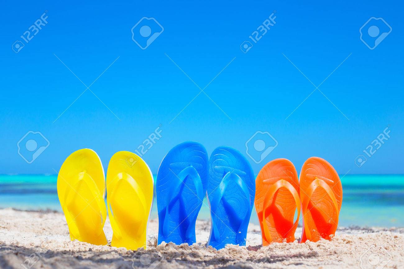 Colorful Beach Flip Flops Sandals On The Colorful Beach Flip Flops Sandals On The