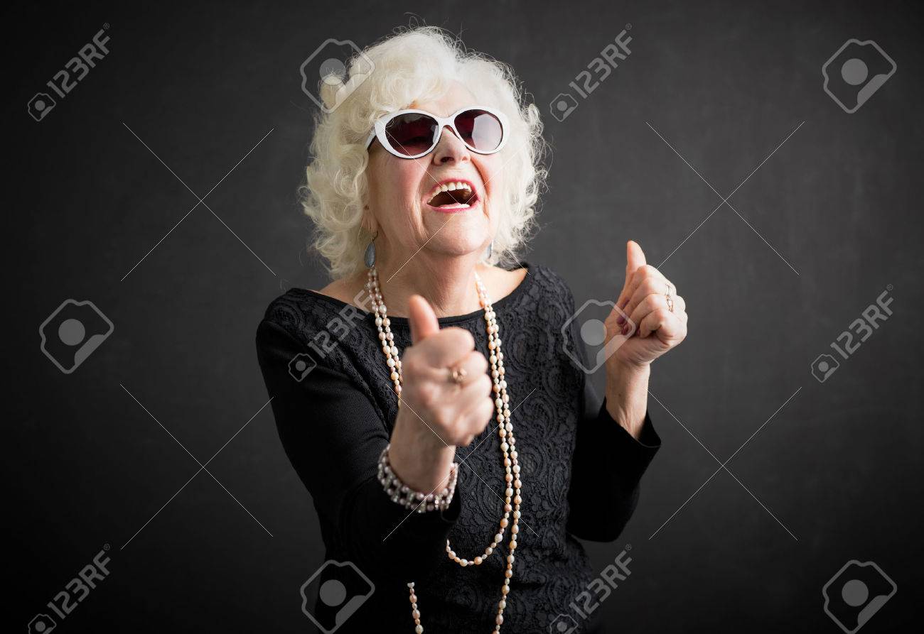 Cool grandma with her thumbs up - 72658890 Cool grandma with her thumbs up - 72658890