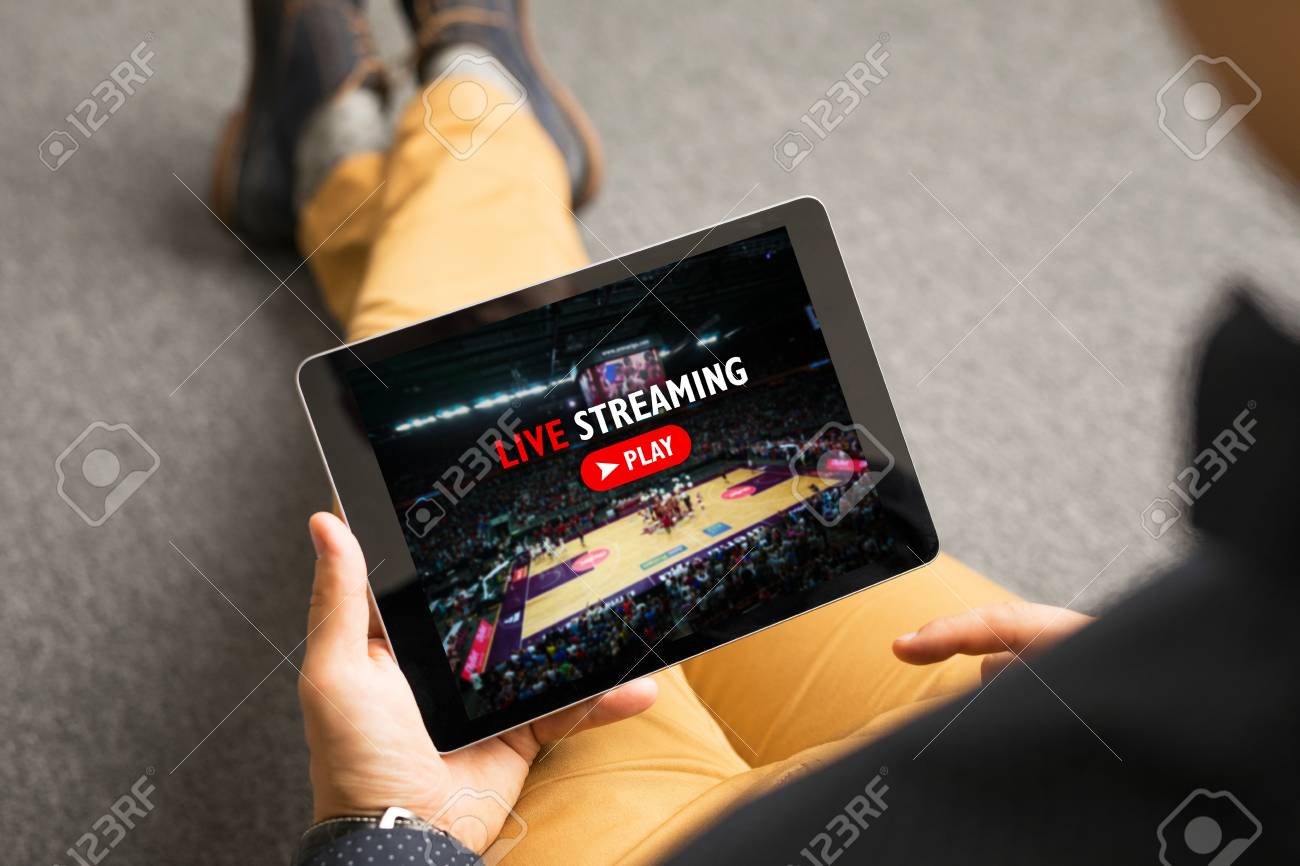 Man Watching Sports On Live Streaming Online Service Stock Photo, Picture And Royalty Free Image