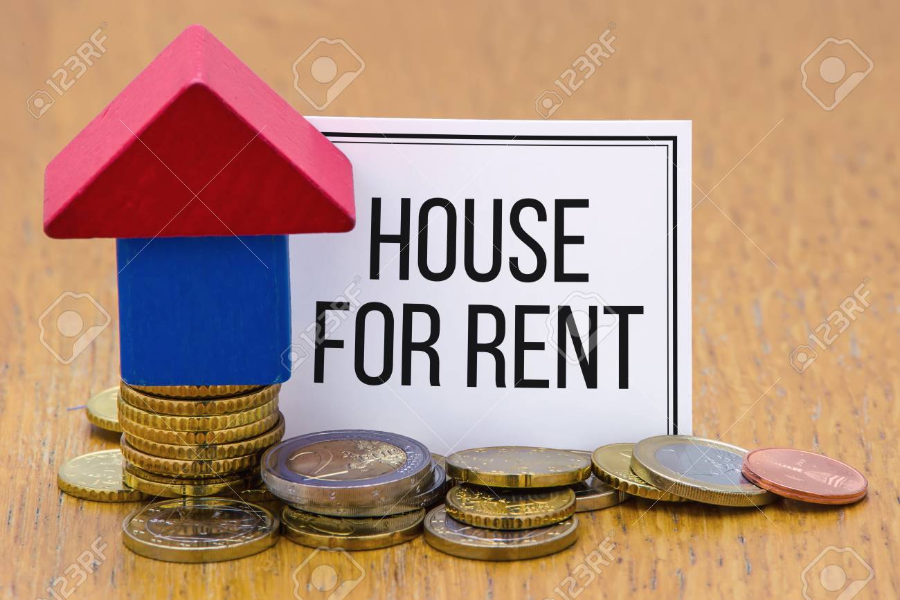 Worter Haus Zur Miete Auf Einem Weissen Papier Mit Einem Holzhaus