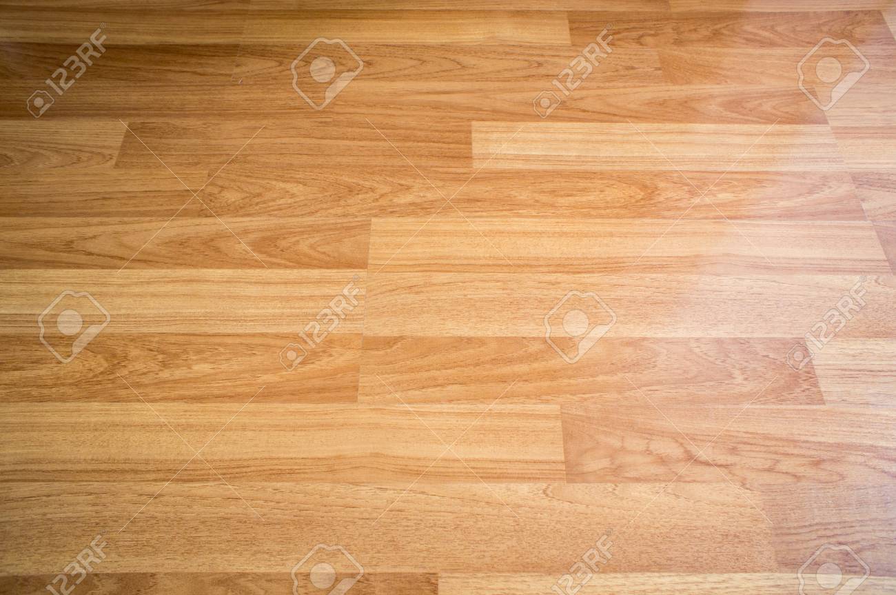 Wooden Texture Background Top View Of Smooth Brown Laminate