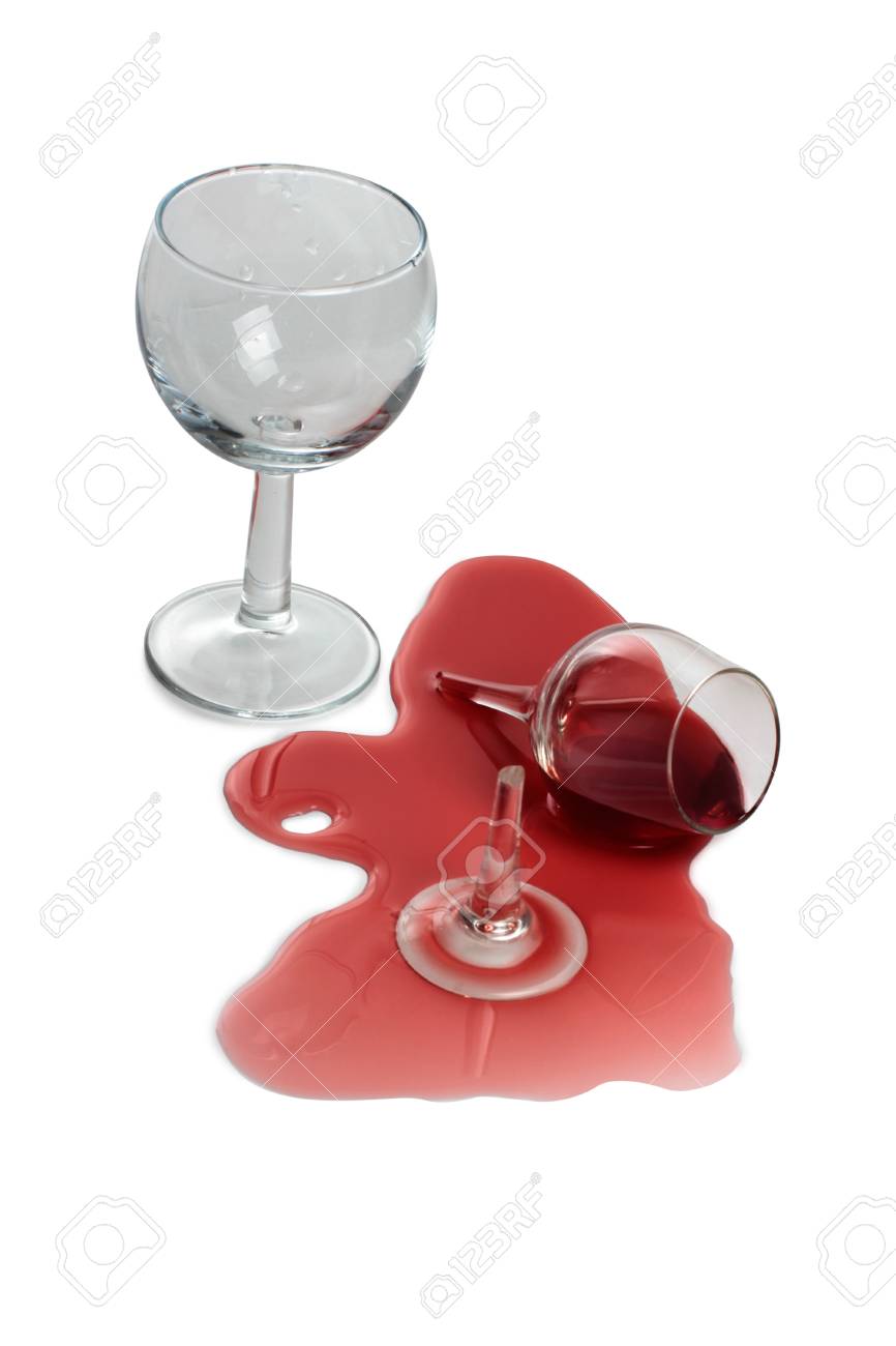 broken glass and spilled red wine on white background stock photo