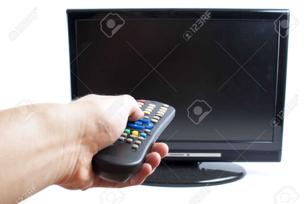 Hand swithing channel in modern television set, on white background - 10654977 Hand swithing channel in modern television set, on white background - 10654977