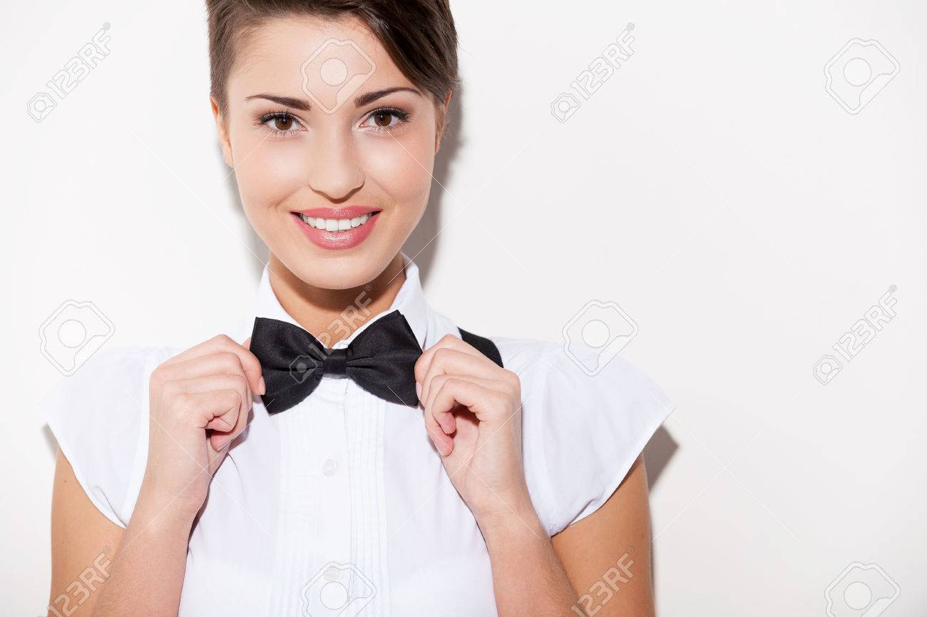 Confident And Stylish Beautiful Young Short Hair Woman In White