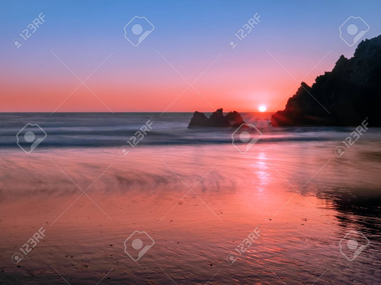Long Exposure Photography Of Jagged Coastal Rocks On The Pacific