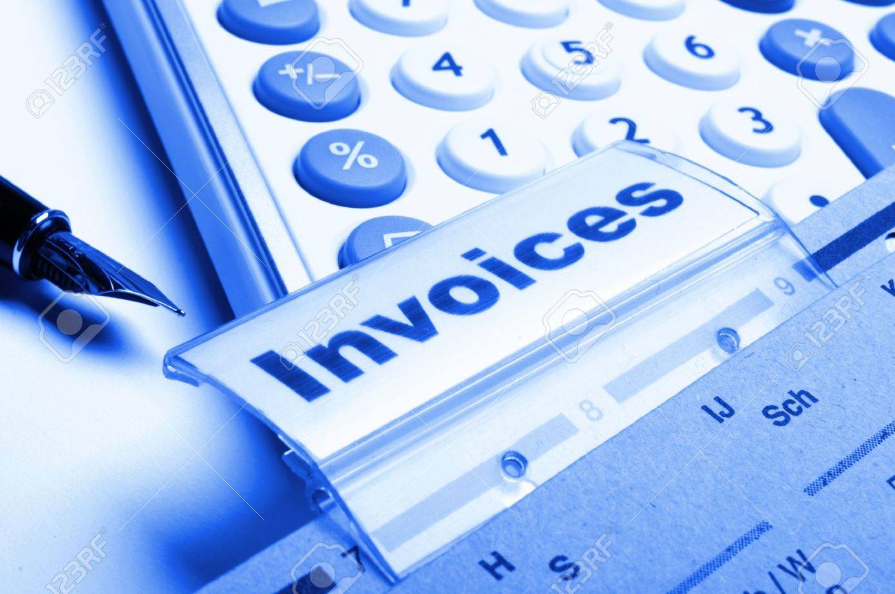 invoice or invoices concept with business folder in office showing stock invoices