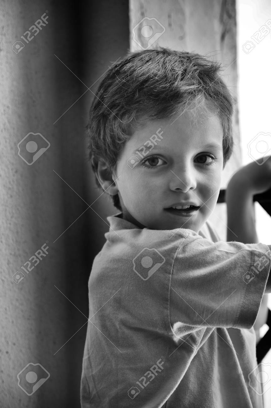 Child, with face of naughty, looking at the camera - 38156633 Child, with face of naughty, looking at the camera - 38156633