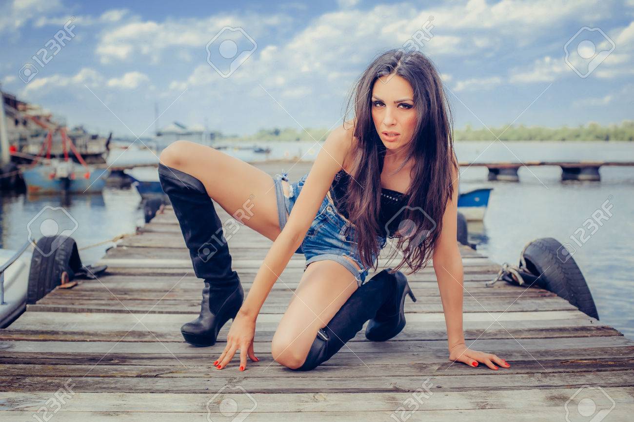 girl in boots and jeans