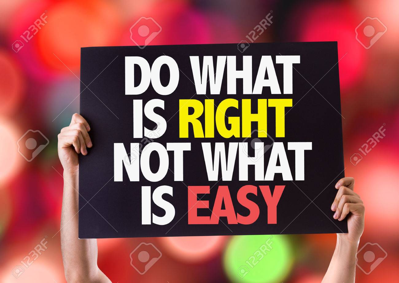 Hands holding card with text Do what is right not what is easy on bokeh background - 61002433 Hands holding card with text Do what is right not what is easy on bokeh background - 61002433