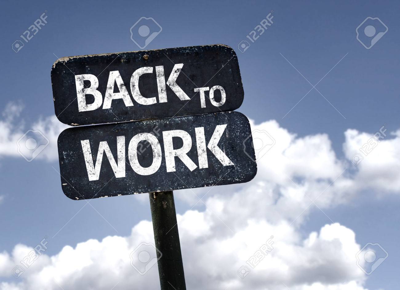 Back To Work sign with clouds and sky background - 55779256 Back To Work sign with clouds and sky background - 55779256