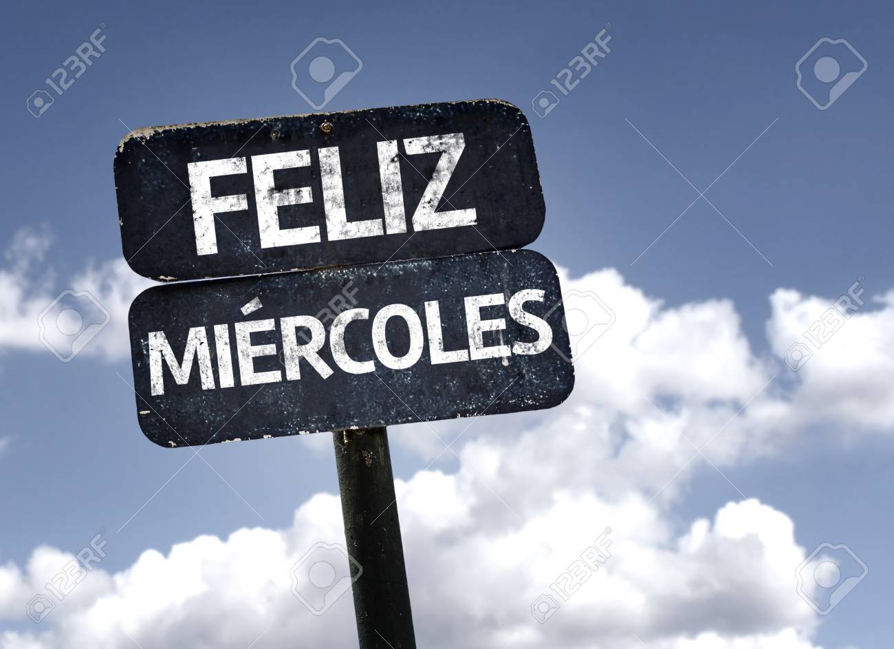 Miercoles (Wednesday In Spanish) Sign On White Paper. Man Hand Holding  Paper With Text. Isolated On Skyscraper Background. Business Concept. Stock  Photo Stock Photo, Picture and Royalty Free Image. Image 77689977.