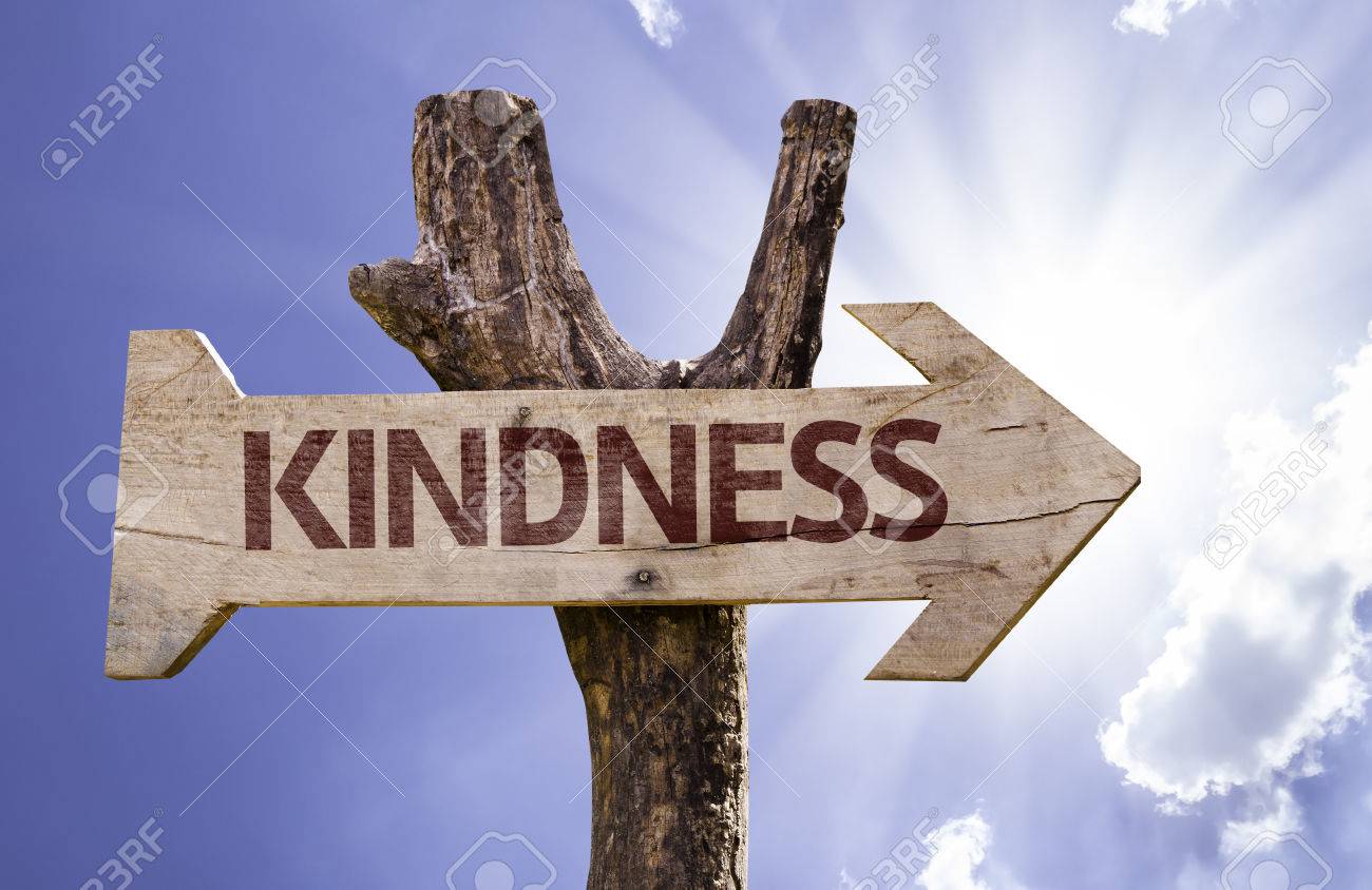 Kindness sign with arrow on sunny background - 61944380 Kindness sign with arrow on sunny background - 61944380
