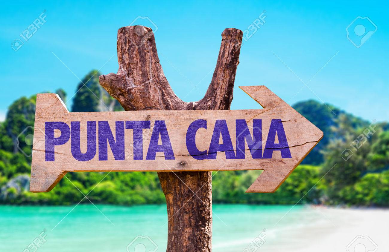 wooden sign board in wetland with text punta cana stock photo