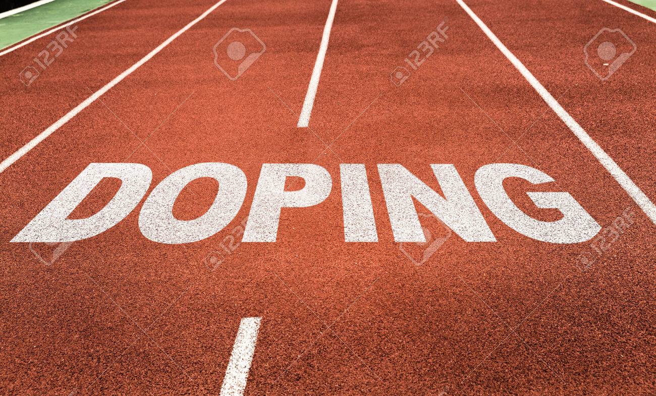 doping written on running track background stock photo picture and