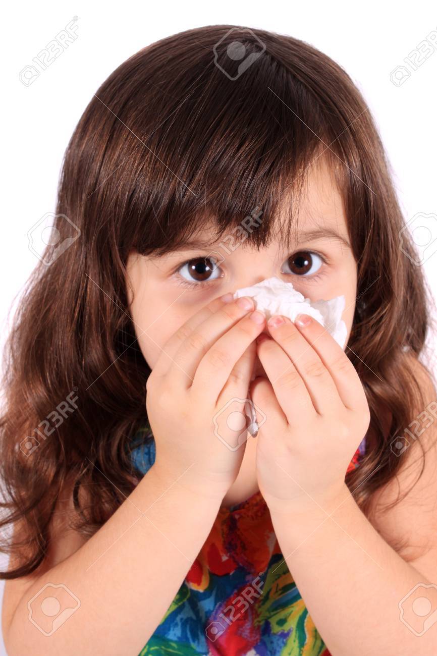 Little three year old girl having the sniffles and wiping her nose with tissue from being sick or allergies - 8244698 Little three year old girl having the sniffles and wiping her nose with tissue from being sick or allergies - 8244698