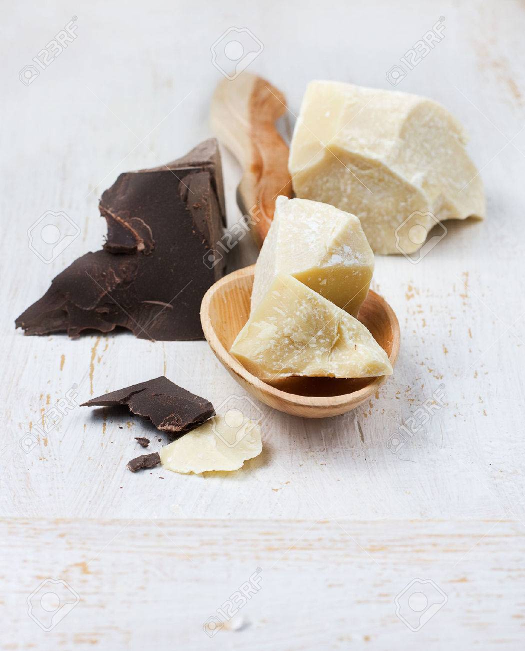 cocoa butter and cocoa mass on white background. selective focus - 38683397 cocoa butter and cocoa mass on white background. selective focus - 38683397