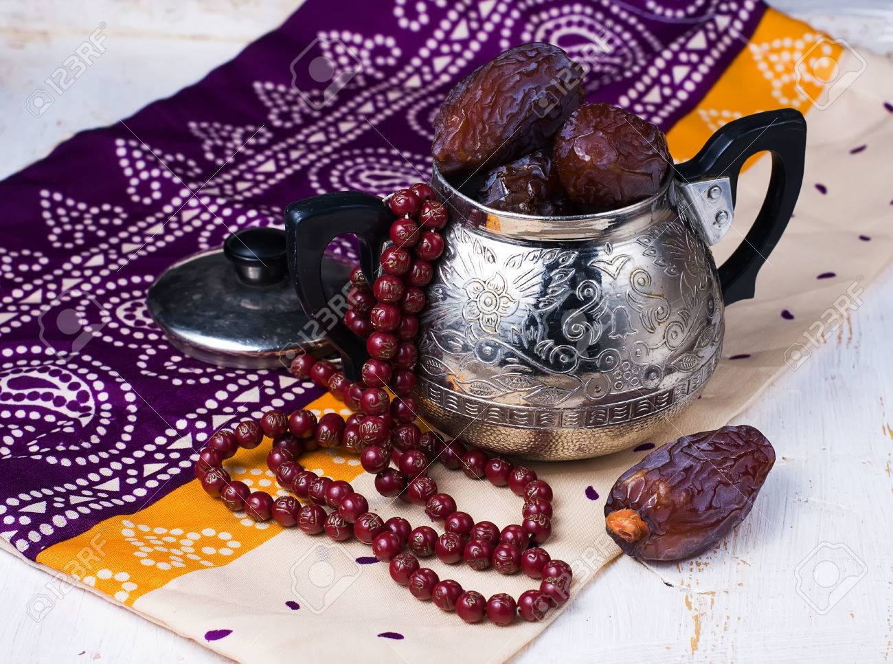 Dates fruit and rosary still life - 38683480 Dates fruit and rosary still life - 38683480