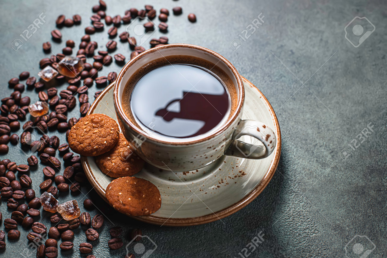 Reflections of a delivery car on a cup of coffee. Online shopping. Concept of delivery services, logistics, cargo delivery. Food delivery background concept. - 171765703 Reflections of a delivery car on a cup of coffee. Online shopping. Concept of delivery services, logistics, cargo delivery. Food delivery background concept. - 171765703