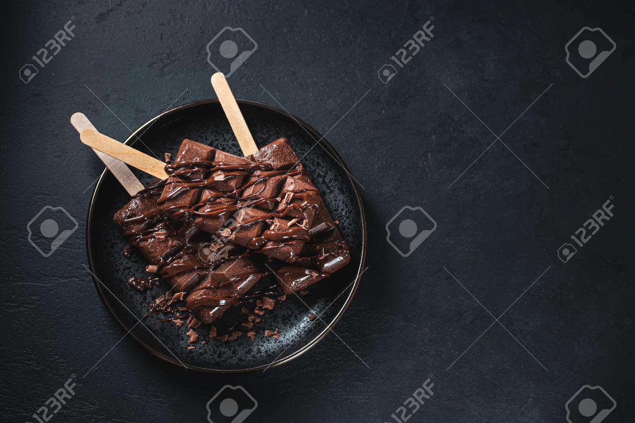 Homemade chocolate ice cream on dark background. Selective focus - 171875082 Homemade chocolate ice cream on dark background. Selective focus - 171875082