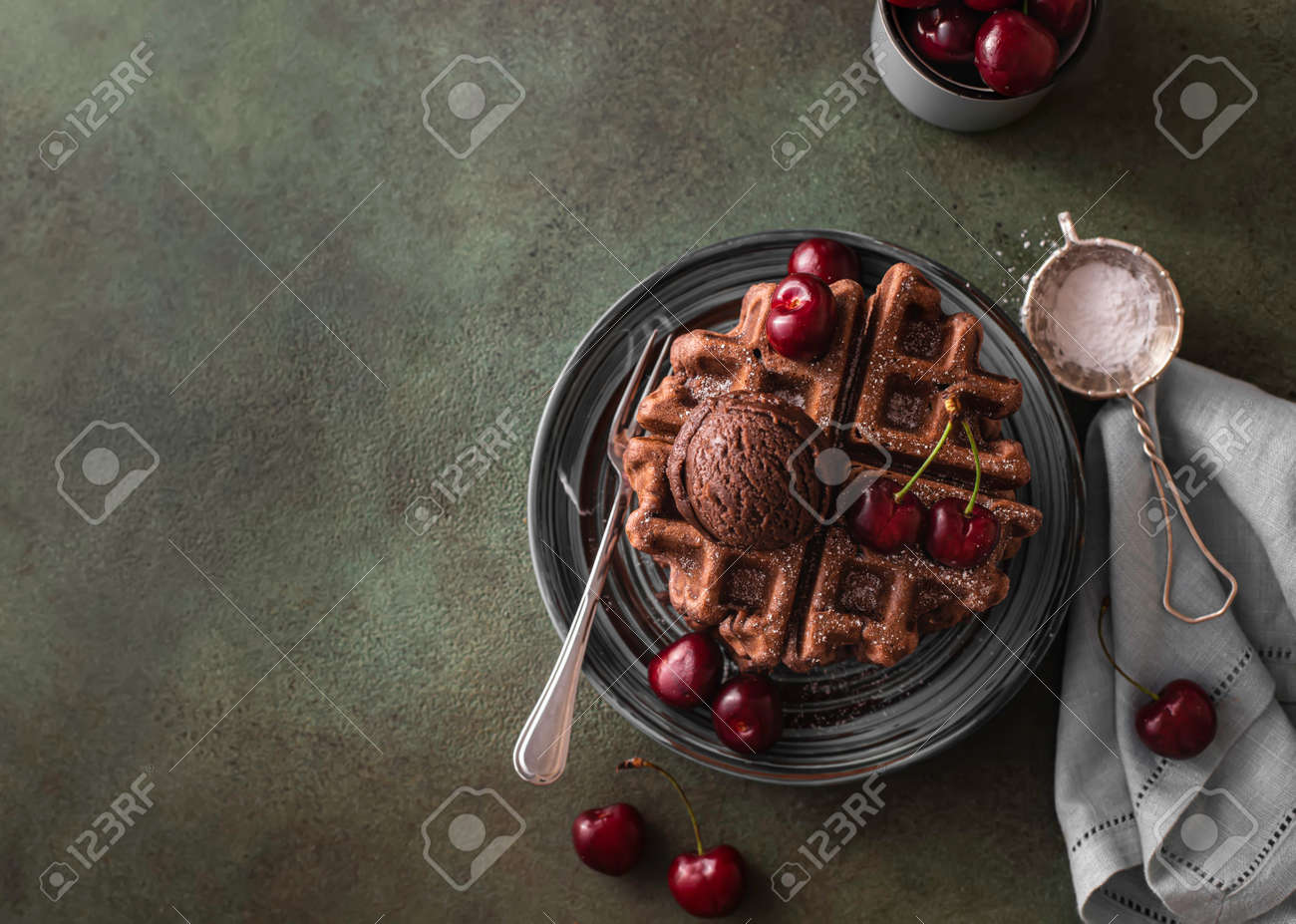 Homemade chocolate waffles with berries and chocolate ice cream. Delicious dessert or breakfast. Close-up - 171890474 Homemade chocolate waffles with berries and chocolate ice cream. Delicious dessert or breakfast. Close-up - 171890474