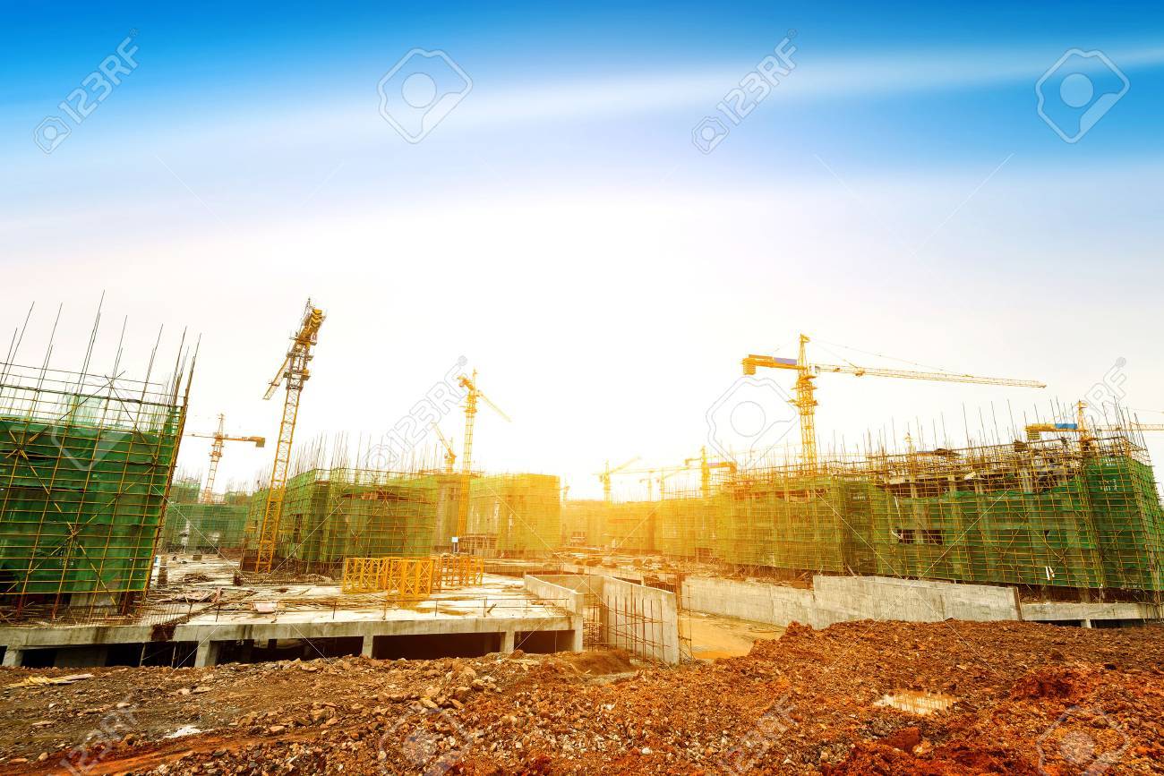 Construction site, workers and cranes. - 37339096 Construction site, workers and cranes. - 37339096