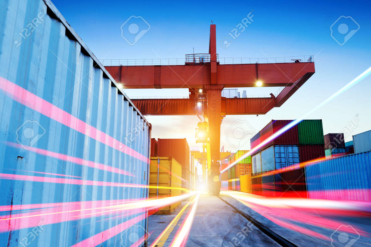 Container terminal at night, working in the bridge crane. - 38288474 Container terminal at night, working in the bridge crane. - 38288474