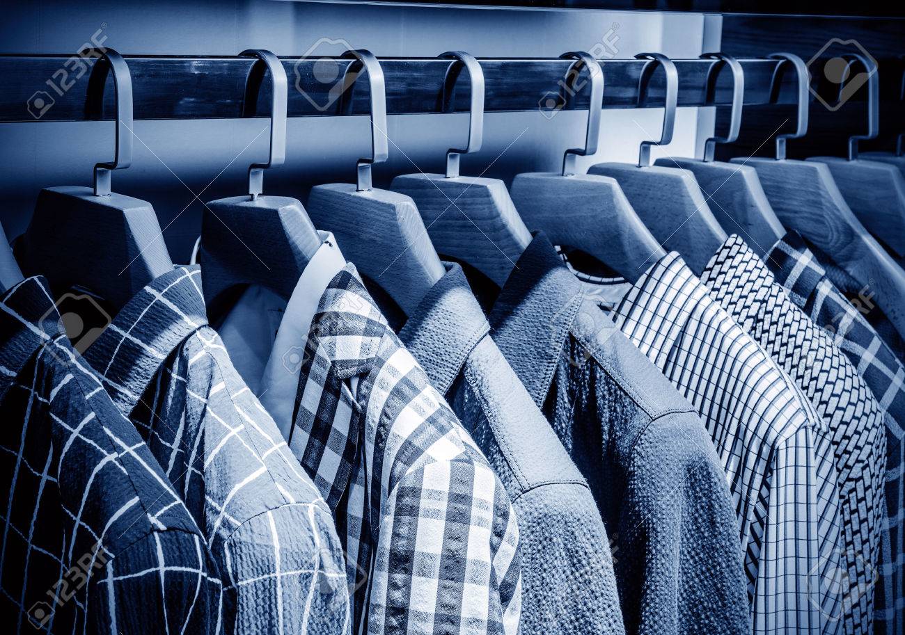 Mens plaid shirts on hangers in a retail store - 40820029 Mens plaid shirts on hangers in a retail store - 40820029