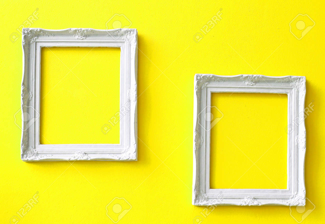 two white vintage frames