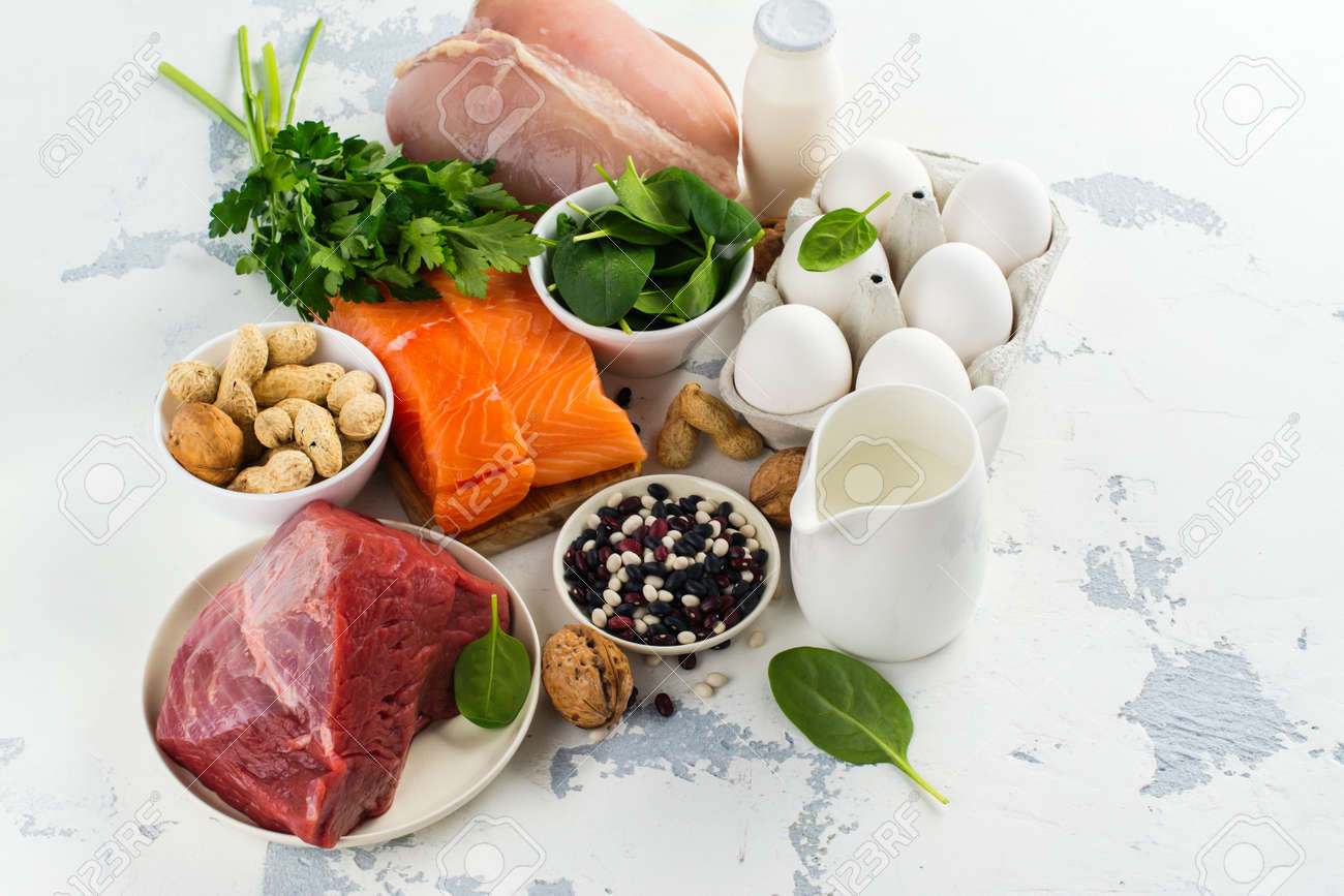 High protein food - fish, meat, poultry, nuts, eggs. Products good for healthy hair. Space for text - 85458682 High protein food - fish, meat, poultry, nuts, eggs. Products good for healthy hair. Space for text - 85458682