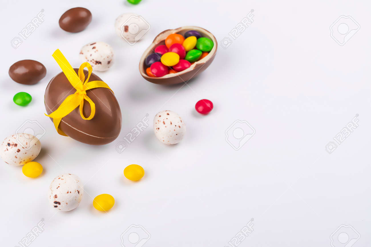 Easter chocolate eggs on pink - 163373335 Easter chocolate eggs on pink - 163373335