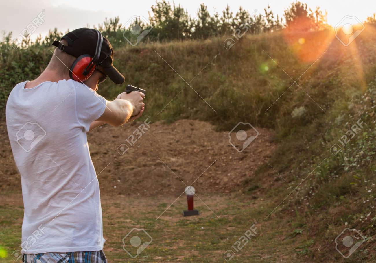 young and handsome caucasian blond guy in military training camp