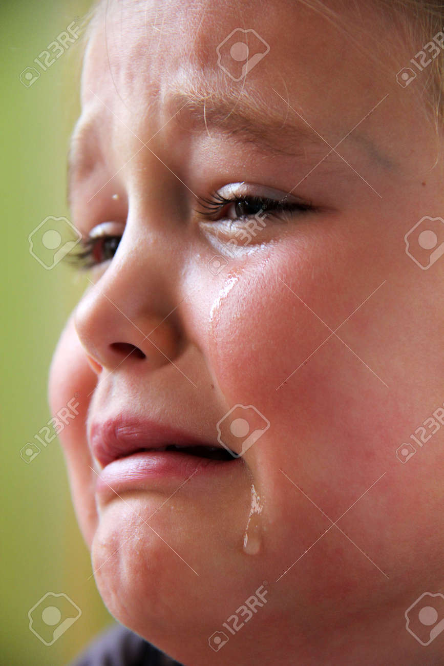 Little Sad Girl With Teardrops In Her Eyes Stock Photo Picture