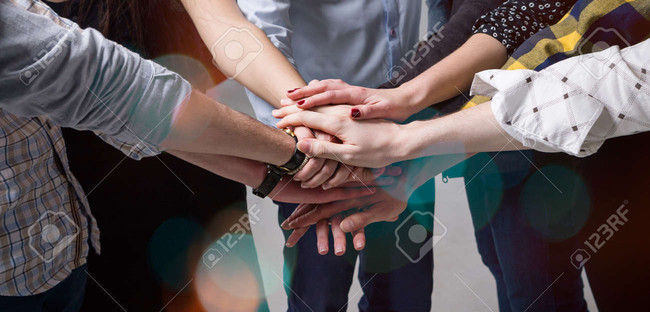 many hands joined together team concept stock photo picture and