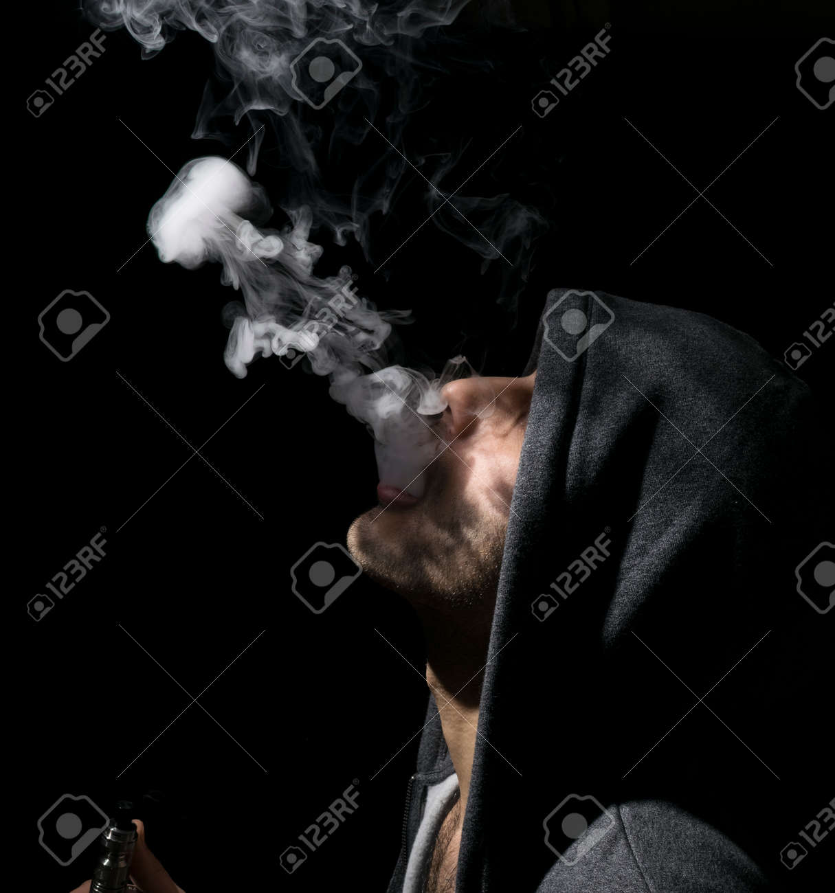 Isolated Man Doing A Jellyfish Trick Of Vaping And Electronic Cigarette.  Stock Photo, Picture and Royalty Free Image. Image 76481905.