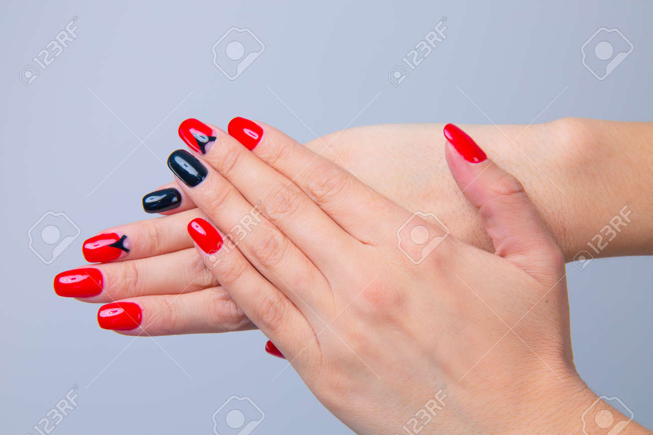 black nails with one red