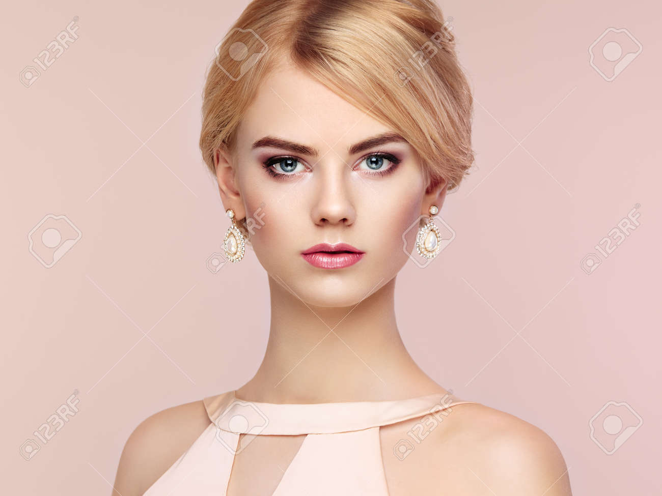 Portrait of beautiful sensual woman with elegant hairstyle. Perfect makeup. Blonde girl. Fashion photo. Jewelry and dress - 47595985 Portrait of beautiful sensual woman with elegant hairstyle. Perfect makeup. Blonde girl. Fashion photo. Jewelry and dress - 47595985