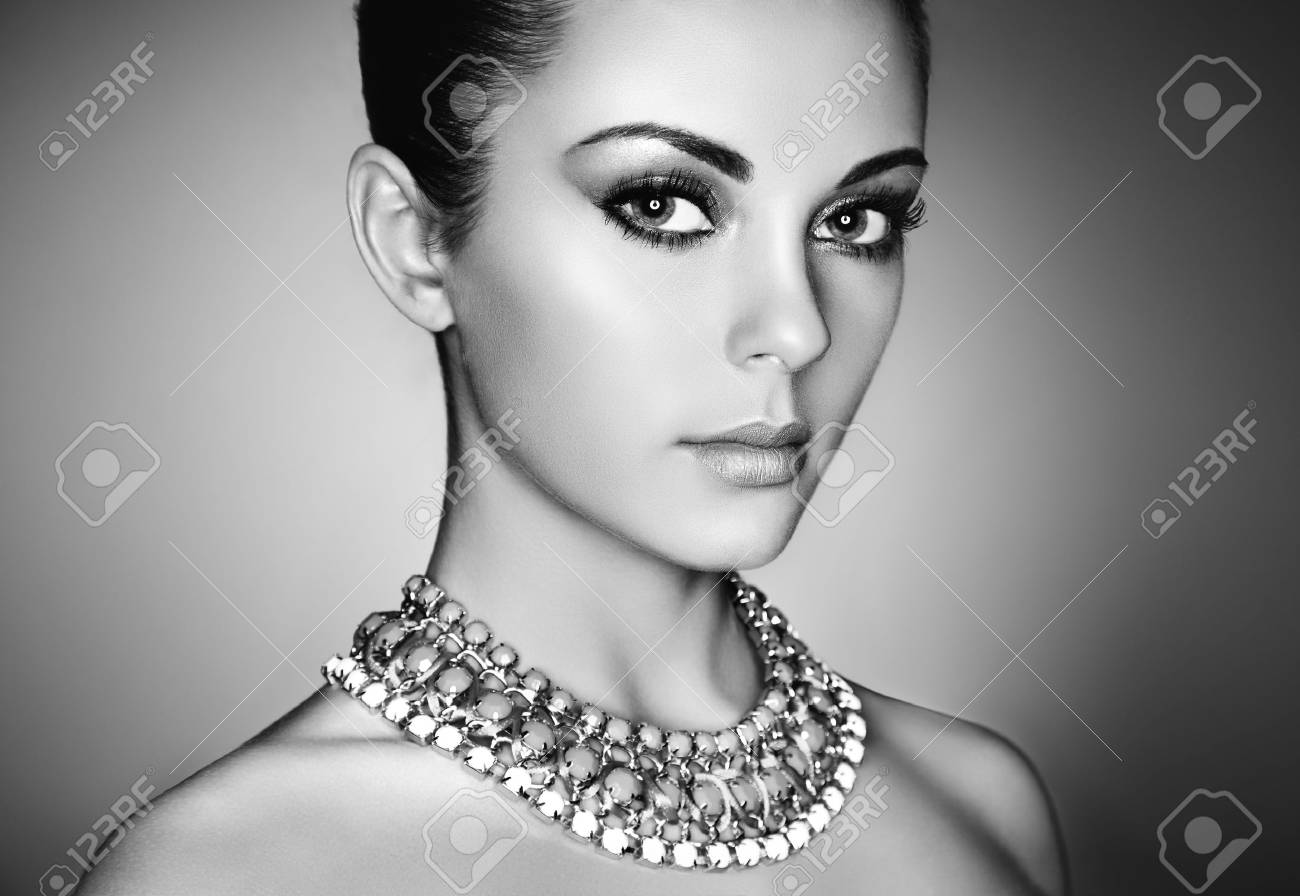 Portrait of young beautiful woman with perfect makeup. Face Girl with necklace close up. Fashion jewelry. Black and White photo - 81163834 Portrait of young beautiful woman with perfect makeup. Face Girl with necklace close up. Fashion jewelry. Black and White photo - 81163834