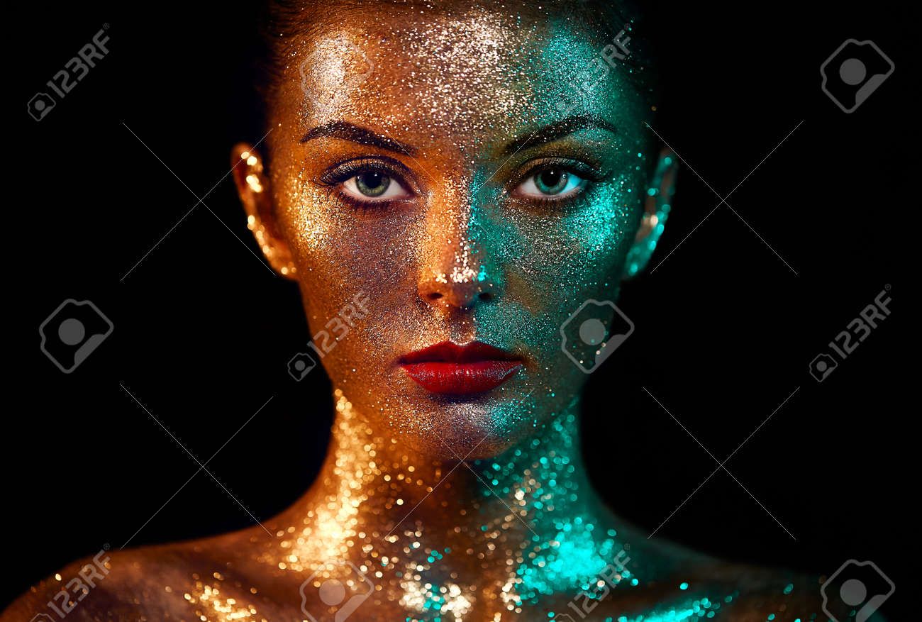 Portrait of Beautiful Woman with Sparkles on her Face. Girl with Art Make-Up in Color Light. Fashion Model with Colorful Makeup - 88595302 Portrait of Beautiful Woman with Sparkles on her Face. Girl with Art Make-Up in Color Light. Fashion Model with Colorful Makeup - 88595302