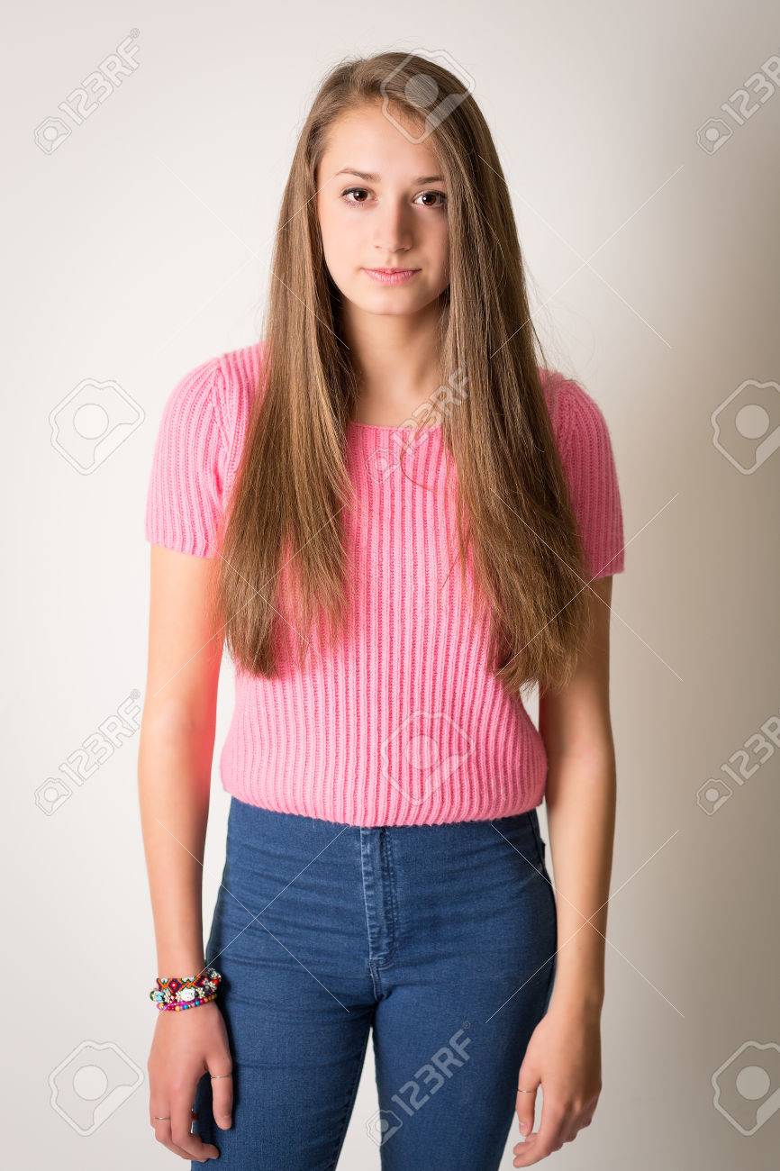 Portrait Of A Beautiful Young Woman With Long Brown Hair In A