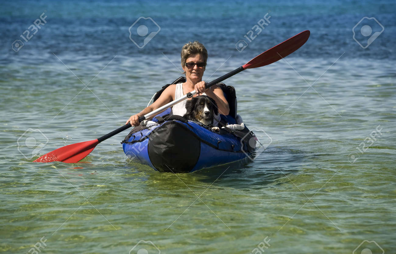 kayak woman and dog stock photo picture and royalty free image