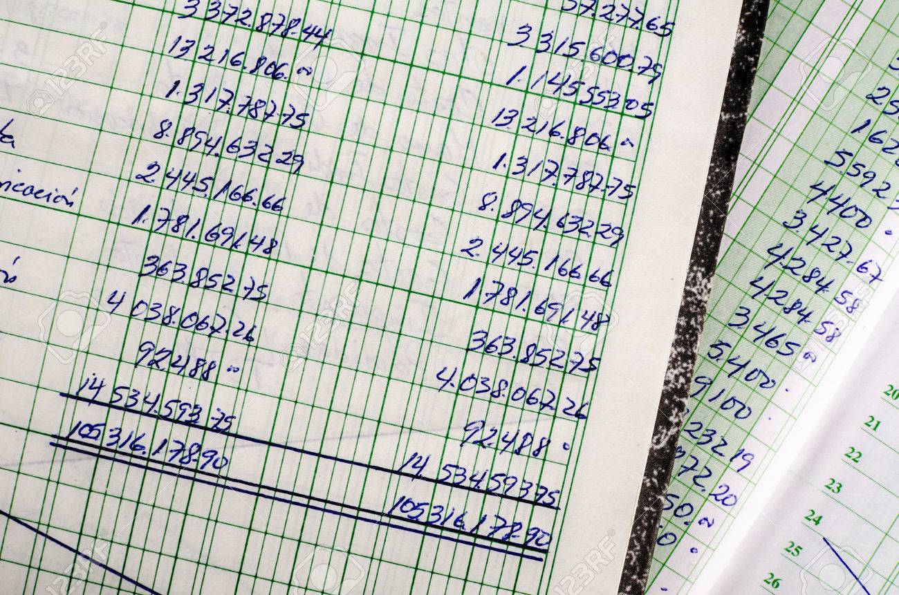 handwritten accounting on the open pages of some old ledgers stock ledger pages