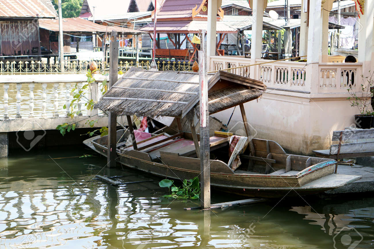 old wooden boat floating