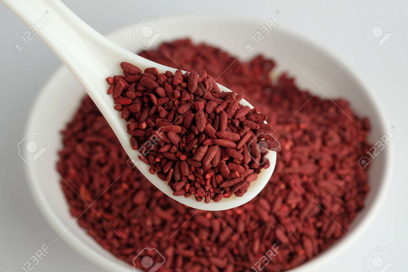 Red Yeast Rice On White Spoon Stock Photo Picture And Royalty
