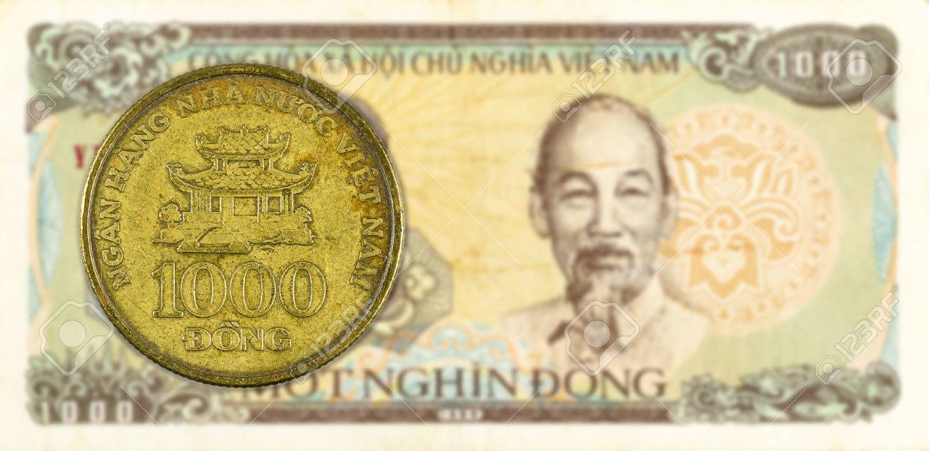 1000 ベトナム ドンの紙幣の表側に対して 1000 ドン コインの写真素材・画像素材 Image 76196731